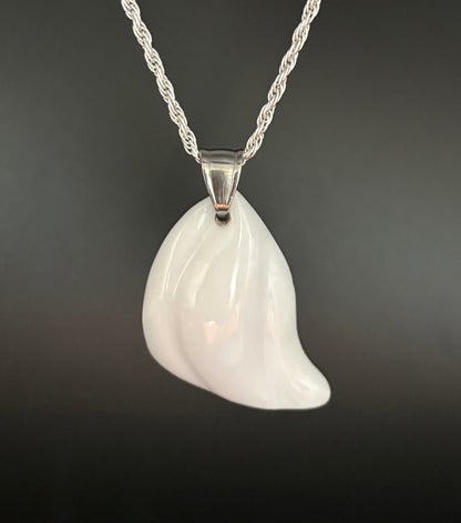 Joy Unleashed - Hand-sculpted Coconut Agate Pendant